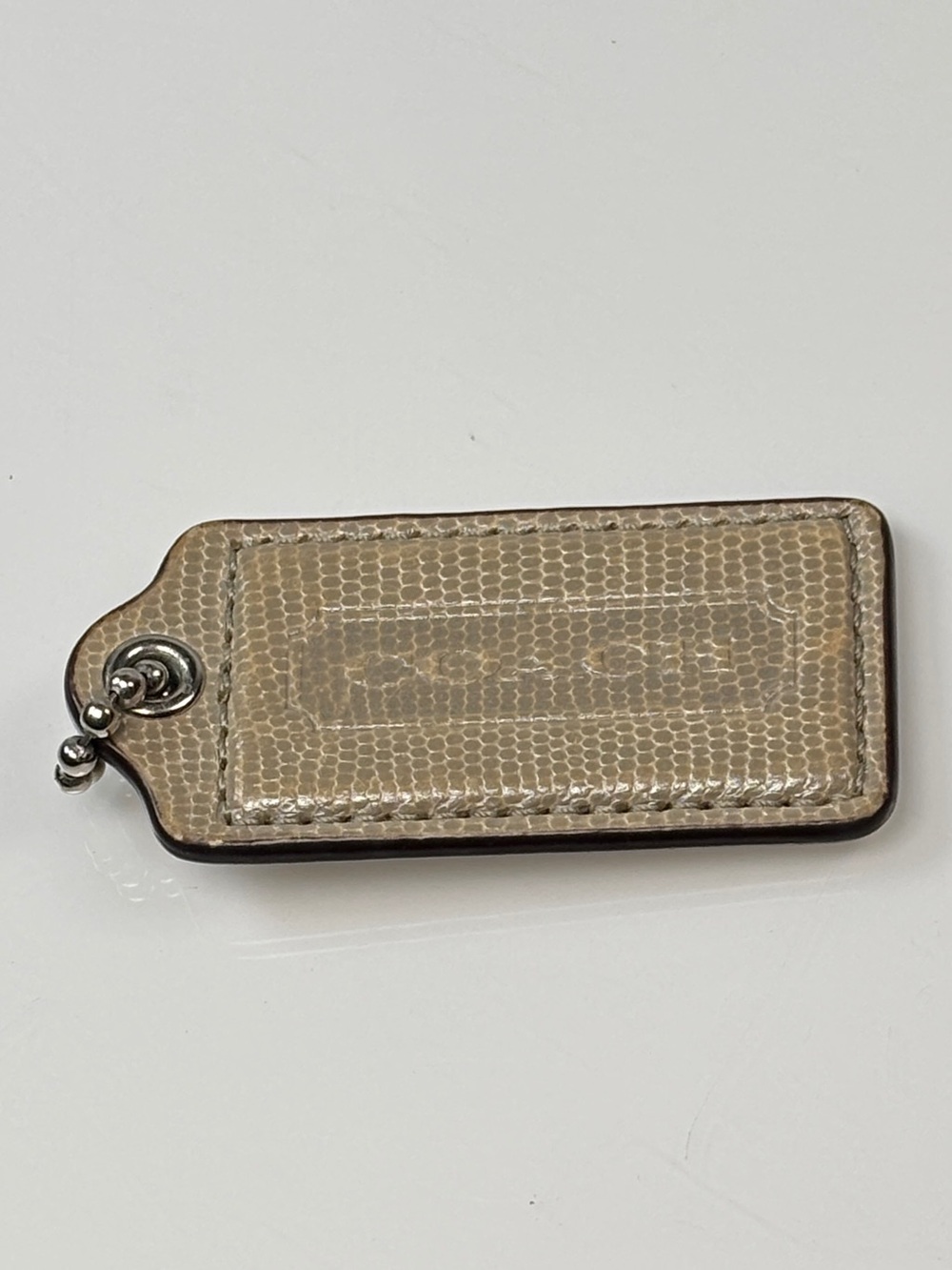 Coach snake embossed tan leather beige hang tag brown Silver chain 2.5 x 1.25 I